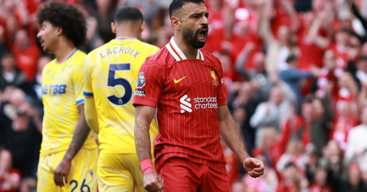 محمد صلاح يحاول الانفصال عن تييري هنري أمام أتلتيكو مدريد