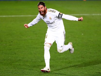 قائد "ريال مدريد" سيرخيو راموس محتفلاً بتسجيل هدفه في مرمى "خيتافي".  - REUTERS