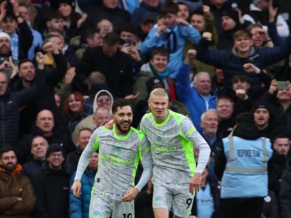 ريان شرقي يحتفل مع هالاند بالتسجيل لمانشستر سيتي ضد فورست - 27 ديسمبر 2025 - Reuters