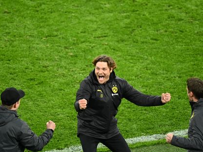 إيدن ترزيتش يحتفل بعد فوز بوروسيا دورتموند على إشبيلية في دوري أبطال أوروبا - Pool via REUTERS