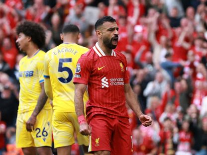 محمد صلاح يحتفل بهدفه مع ليفربول أمام كريستال بالاس بالدوري الإنجليزي - 25 مايو 2025 - Reuters