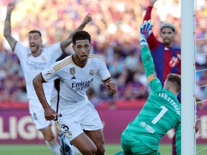جود بيلينغهام بعد تسجيله هدفاً لريال مدريد في مرمى برشلونة - 28 أكتوبر 2023 - AFP
