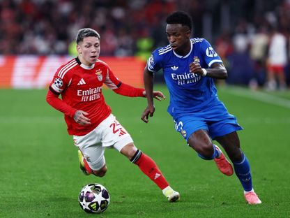 جيانلوكا بريستياني وفينيسيوس جونيور خلال مباراة بنفيكا وريال مدريد بدوري أبطال أوروبا - 20 فبراير 2026 - Reuters