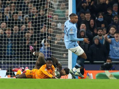 مانويل أكانجي مدافع مانشستر سيتي وفينسيوس لاعب ريال مدريد - 11 فبراير 2025 - Reuters