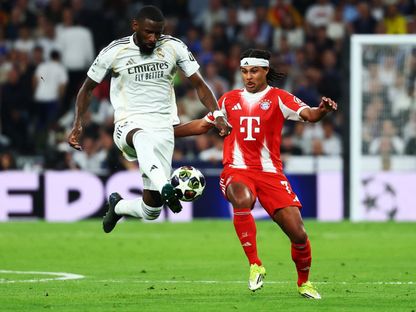 أنطونيو روديغر وسيرج غنابري خلال مباراة ريال مدريد وبايرن ميونيخ بدوري أبطال أوروبا - 7 أبريل 2026 - Reuters