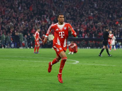 مايكل أوليس يحتفل بهدفه في مباراة بايرن ميونيخ وريال مدريد بدوري أبطال أوروبا - 15 أبريل 2026 - Reuters