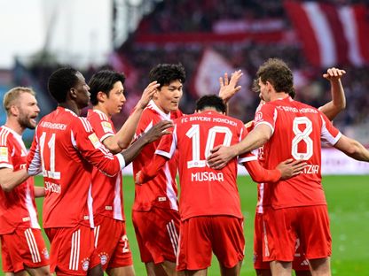 لاعبو بايرن ميونيخ يحتفلون بالهدف الثاني أمام سانت باولي في الدوري الألماني - 11 أبريل 2026 - Reuters