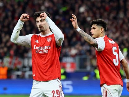 كاي هافيرتز لاعب أرسنال يحتفل بعد تسجيل هدف في شباك باير ليفركوزن ضمن دوري أبطال أوروبا - 12 مارس 2026 - REUTERS