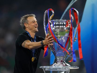 لويس إنريكي مدرب باريس سان جيرمان مع لقب دوري أبطال أوروبا - 31 مايو 2025 - Reuters