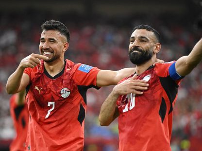 محمود تريزيغيه يحتفل بهدفه مع محمد صلاح خلال مباراة مصر ونيوزيلندا بكأس العالم - 22 يونيو 2026 - Reuters