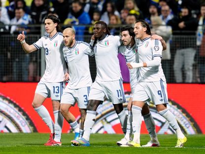 لاعبون من منتخب إيطاليا يحتفلون بهدف في مرمى البوسنة والهرسك بنهائي ملحق كأس العالم - 31 مارس 2026 - Reuters