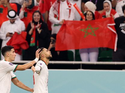 يوسف النصيري ونايف أكرد يحتفلان بهدف المغرب في مرمى كندا - 1  ديسمبر - reuters