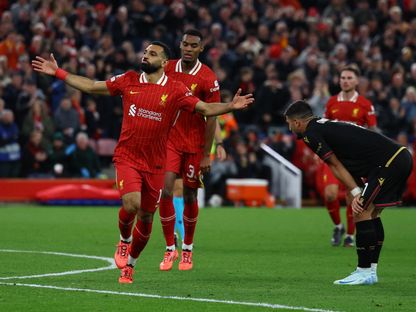 محمد صلاح نجم ليفربول يحتفل بتسجيل هدف في مرمى بولونيا الإيطالي بدوري أبطال أوروبا - 2 أكتوبر 2025 - Reuters