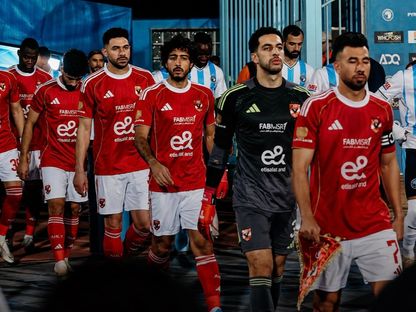 لاعبو بيراميدز والأهلي , مهند لاشين ومحمود تريزيغيه ومصطفى شوبير ومحمد هاني وياسر إبراهيم أثناء دخولهم أرض ملعب الدفاع الجوي في مباراة بالدوري المصري - 27 أبريل 2026 - @ahly/x
