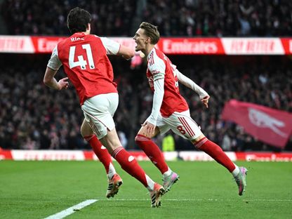 مارتن أوديغارد قائد أرسنال يحتفل بهدفه في مرمى برايتون في الدوري الإنجليزي الممتاز - 27 ديسمبر 2025 - Reuters