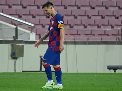 لاعب "برشلونة" ليونيل ميسي خلال المباراة التي جمعت فريقه بفريق "أتلتيكو مدريد". - AFP