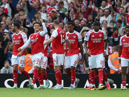 لاعبو أرسنال يحتفلون بالتسجيل ضد فورست في الدوري الإنجليزي الممتاز - 13 سبتمبر 2025 - Reuters