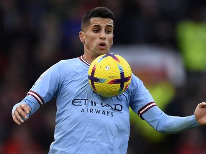 البرتغالي جواو كانسيلو خلال مباراة بين مانشستر سيتي ومانشستر يونايتد في الدوري الإنجليزي - 14 يناير 2023 - AFP