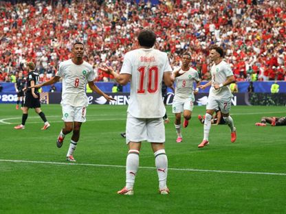 براهيم دياز لاعب المغرب يحتفل مع عز الدين أوناحي ضد كندا - 4 يوليو 2026 - Reuters