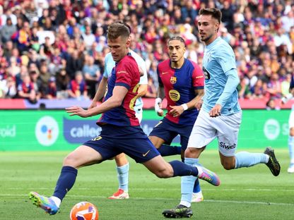 داني أولمو في مباراة برشلونة وسيلتا فيغو في الليغا 19-4-2025 - Reuters