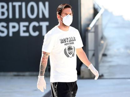 ليونيل ميسي في المدينة الرياضية لنادي برشلونة  - AFP