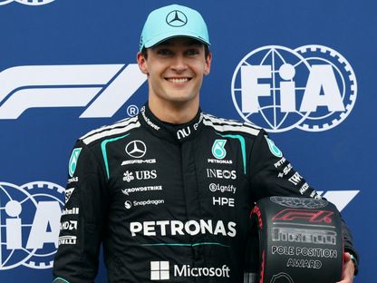 جورج راسل سائق مرسيدس يحتفل بحصوله على مركز أول المنطلقين في جائزة أستراليا لفورمولا 1 - 7 مارس 2026 - Reuters