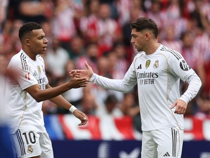كيليان مبابي وفيديريكو فالفيردي من مباراة ريال مدريد وأتلتيكو مدريد بالدوري الإسباني - 27 سبتمبر 2025 - Reuters