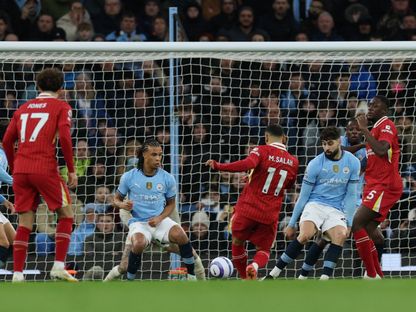 محمد صلاح مهاجم ليفربول يسجل أمام مانشستر سيتي - 23 فبراير 2025 - Reuters