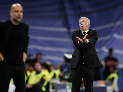 بيب غوارديولا وكارلو أنشيلوتي أثناء مباراة مان سيتي وريال مدريد 9-5-2023 - Reuters