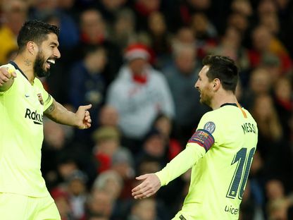 لويس سواريز يحتفل بالهدف الأول لبرشلونة مع زميله ليونيل ميسي أمام مانشستر يونايتد في ربع نهائي دوري أبطال أوروبا - 10 أبريل 2019 - Reuters