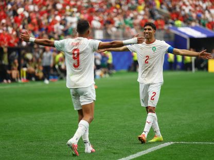 أشرف حكيمي يحتفل مع سفيان رحيمي في مباراة المغرب ضد كندا - 4 يوليو 2026 - Reuters