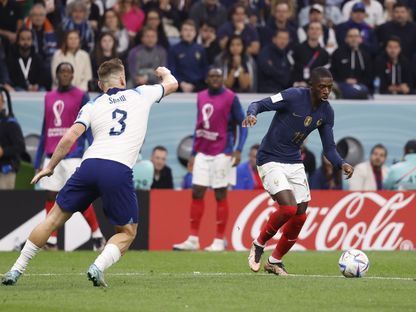 عثمان ديمبيلي خلال مواجهة فرنسا وإنجلترا في كأس العالم 2022 - reuters