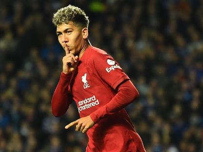 روبرتو فيرمينو مهاجم ليفربول يحتفل بهدفه في شباك رينجرز في دوري أبطال أوروبا - 12 أكتوبر 2022 - AFP