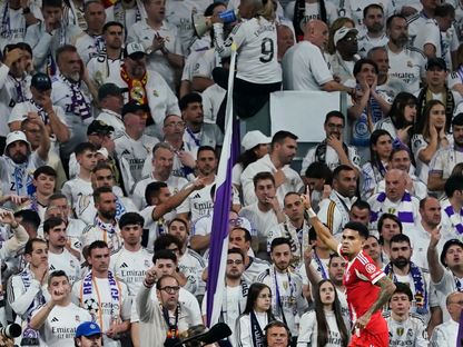 مشجعون لريال مدريد خلال مباراة ضد بايرن ميونيخ في دوري أبطال أوروبا - 7 أبريل 2026 - Reuters