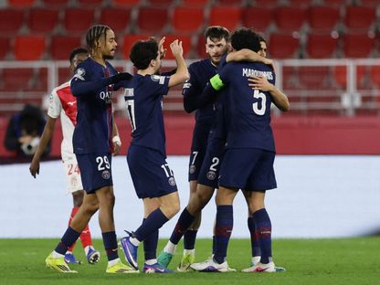 لاعبو باريس سان جيرمان يحتفلون بالتسجيل ضد موناكو في دوري أبطال أوروبا - 17 فبراير 2026 - Reuters