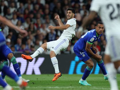 ماركو أسينسيو يُسجل هدف الفوز لريال مدريد في شباك خيتافي - 13 مايو 2023 - Reuters