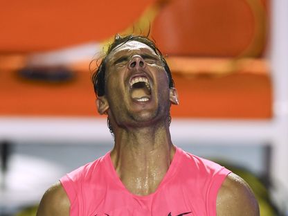 رافاييل نادال يحتفل بعد فوزه على البلغاري غريغور ديميتروف - AFP