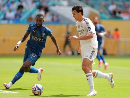 غونزالو غارسيا مهاجم ريال مدريد في مواجهة حسن التمبكتي مدافع الهلال - 18 يونيو 2025 - Reuters