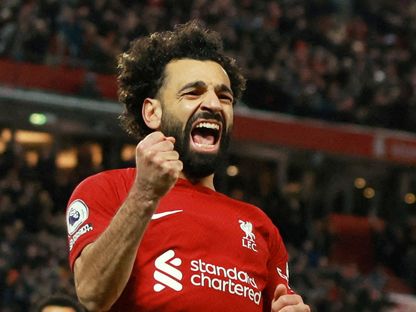 لاعب ليفربول محمد صلاح يحتفل بالتسجيل في مرمى وولفرهامبتون في الدوري الإنجليزي - 1 مارس 2023 - REUTERS