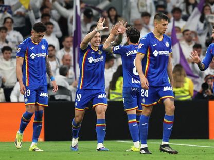 لاعبو خيتافي يحتفلون بالتسجيل أمام ريال مدريد في سانتياغو برنابيو - 2 مارس 2026 - Reuters