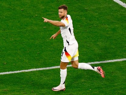 الألماني نيكلاس فولكروغ يحتفل بتسجيل هدف تم إلغاؤه لاحقاً خلال مباراة اسكتلندا في المجموعة الأولى ببطولة يورو 2024 - 14 يونيو 2024 - ٌReuters