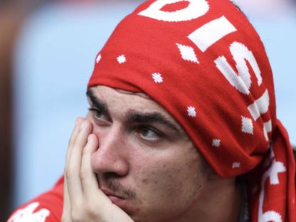 حزن مشجع تونس بعد الخسارة امام استراليا في مونديال 2022 - Getty