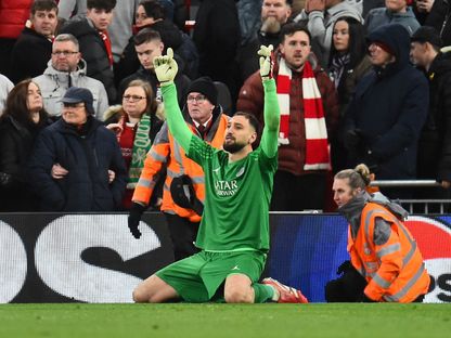جيانلويجي دوناروما يحتفل بتأهل باريس سان جيرمان لربع نهائي دوري أبطال أوروبا على حساب ليفربول - 11 مارس 2025 - Reuters