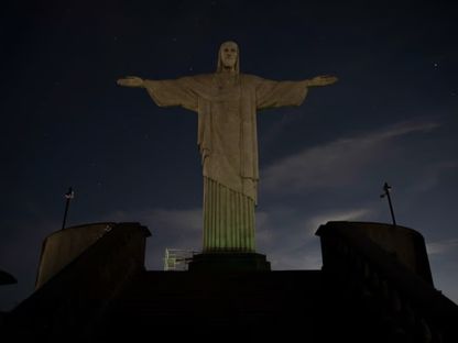 الظلام يحل على تمثال كريستو ريدينتور تضامناً مع فينيسيوس جونيور في قضيته ضد العنصرية - Reuters