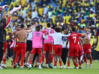 لاعبو الوداد الرياضي يحتفلون بعد التأهل لنهائي دوري أبطال إفريقيا على حساب ماميلودي صن داونز - 20 مايو 2023 - REUTERS