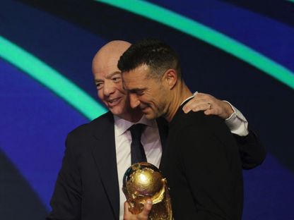 جياني إنفانتينو وليونيل سكالوني خلال قرعة نهائيات كأس العالم 2026 - 5 ديسمبر 2026 - Reuters