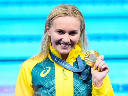 أريارن تيتموس بعد نيلها الميدالية الذهبية في سباق 400 متر سباحة حرة للسيدات خلال أولمبياد باريس - 27 يوليو 2024 - Rob Schumacher-USA TODAY Sports