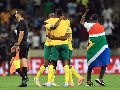 لاعبو جنوب إفريقيا يحتفلون بالتأهل إلى كأس العالم بعد الفوز على رواندا - 14 أكتوبر 2025 - Reuters