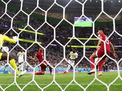 من مباراة قطر والسنغال - Reuters