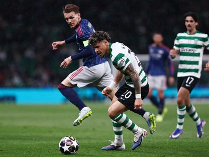 ماكسيميليانو أراوخو ومارتن أوديغارد من مباراة سبورتينغ لشبونة وأرسنال بدوري أبطال أوروبا - 7 أبريل 2026 - Reuters